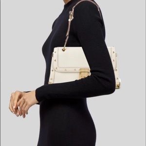 Authentic. Louis Vuitton suhali Le Talentueux  white leather shoulder bag